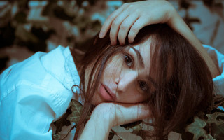 Woman long hair hands head - free portrait wallpaper for desktop