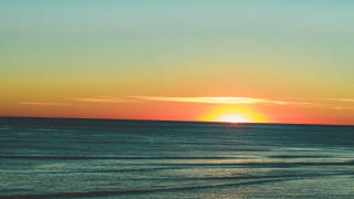 Sunset ocean surfer boat cloud - the water and a boat free wallpaper