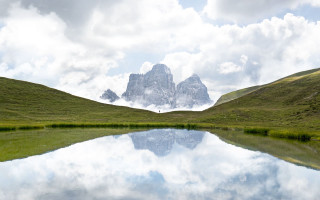 Mountain lake clouds nature beach - a lake in the foreground free wallpaper
