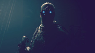 Futuristic man glowing eyes gun - a futuristic suit free wallpaper