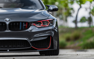 Car street trees blurry depth - a close up of a car free wallpaper for desktop
