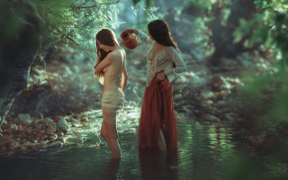 Two women stream woods holding - the other holding free wallpaper for desktop