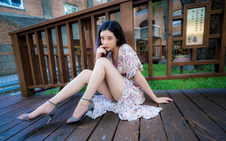 Woman deck phone floral dress - a deck free wallpaper