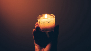 Candle lit symbolism person holding - candle free wallpaper