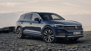 Blue volkswagen suv mountains water - 8k photorealistic free wallpaper