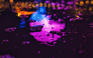 Puddle colorful lights black surface - elsa bleda free wallpaper