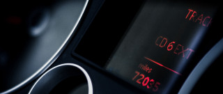 Speedometer red light black background - typographic free wallpaper for desktop