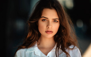 Serious woman longhair white shirt - free portrait wallpaper for desktop