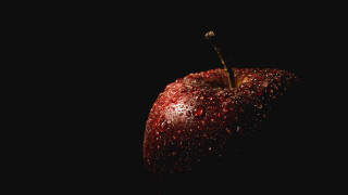 Red apple water droplets dark 2 - a red apple free wallpaper for desktop