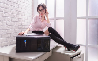 Woman sitting laptop blackstockings glassesskirt - black stocking free wallpaper