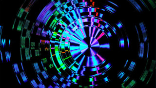 Colorful circular holographic design glowing - a green center free wallpaper for desktop