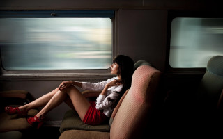 Woman sitting train seat cinematic - anka zhuravleva free wallpaper