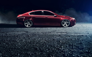 Red car dark parking lot - a red car free wallpaper