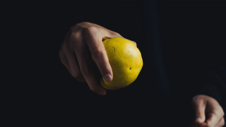 Person holding yellow apple black - a yellow apple free wallpaper