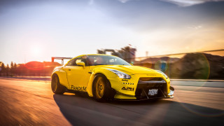 Yellow sports car sunset road 4 - the sun behind free wallpaper