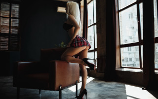 Woman sitting room white hair - a chair in a room free wallpaper for desktop