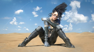 Woman black outfit sitting desert 2 - her hand and a sky background free wallpaper