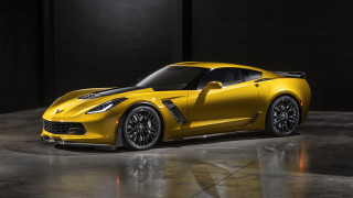 Yellow corvette sports car dark - a black wall behind free wallpaper