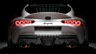 White sports car lit dark - a black floor free wallpaper for desktop