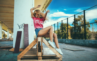 Woman red shirt blue shorts 3 - a wooden platform free wallpaper