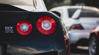 Car tail lights traffic blurry - cinematic focus free wallpaper