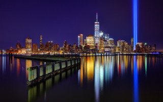 City skyline rainbow light bridge - reflective free wallpaper
