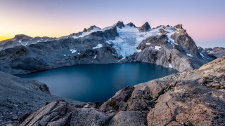 Mountain lake rocks snow sunset - rock free wallpaper