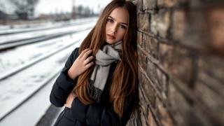Elina karimova brick wall scarf - a woman leaning against a brick wall free wallpaper