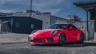 Red sports car parking lot 22 - a parking lot next free wallpaper