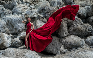 Woman in red dress rocky - a rocky beach next free wallpaper