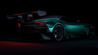 Green sports car dark room 7 - side profile free wallpaper