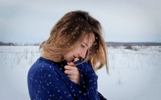 Woman blowing hair snow elina - a blue jacket free wallpaper