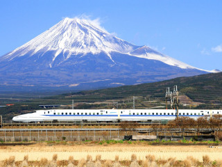 Train mountain snowfield bridge cityscape - peak in the background free wallpaper for desktop