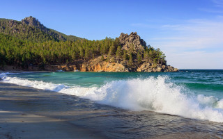 Crashing wave beach rock formation - a rock formation free wallpaper