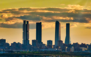 City skyline cloudy dusk orange - tall building free wallpaper