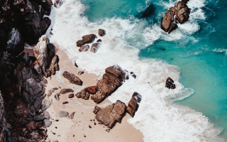 Beach rock formation water shore - a rocky shore free wallpaper for desktop