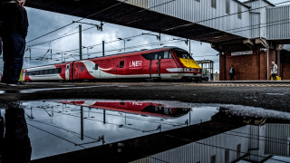 Red train bridge platform puddle - a puddle of water free wallpaper