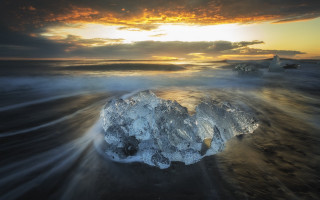 Rock ocean sunset clouds landscape - an abstract sculpture free wallpaper