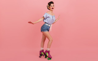 Woman rollerblading pink background fashion - short free wallpaper for desktop