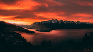 Red sky lake mountains cityscape - cinematic landscape free wallpaper for desktop