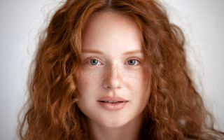 Freckled woman smile realistic portrait - hair free wallpaper