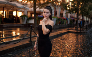 Woman black dress night street - a cobblestone street free wallpaper for desktop