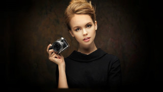 Woman holding camera portrait red - a camera free wallpaper for desktop