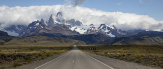 Long road mountains clouds sign - a long road free wallpaper