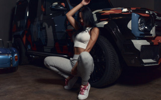 Woman white top grey sweatpants - full body pose free wallpaper for desktop