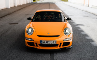 Yellow car street white building - a yellow car free wallpaper