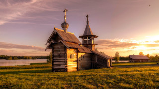 Wooden church sunset lake tower - a lake in the background free wallpaper