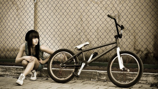 Woman bike fence brick outdoors - cool free wallpaper