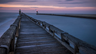 Pier lighthouse dusk tiltshift cloudy - a lighthouse in the distance free wallpaper