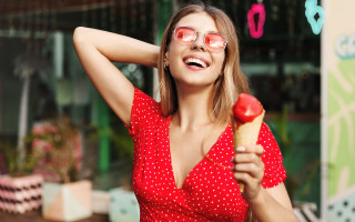 Red dress woman pastry smiling - her hand behind her head free wallpaper for desktop